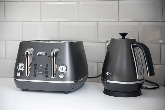 Grey toaster and kettle on kitchen worktop.