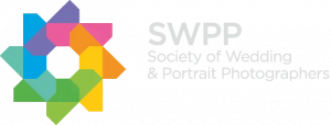 Logo for the society of wedding and portrait photographers.